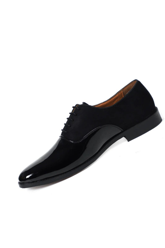 Black dress shoe on a white background