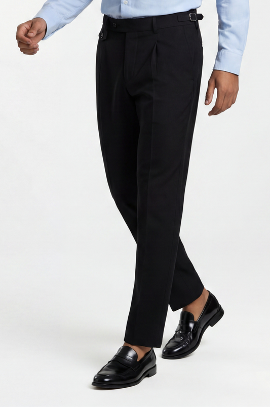 Blutailor black Gurkha trousers in premium fabric with a custom tailored fit, featuring high-waist design and adjustable side tabs for a refined, structured look.