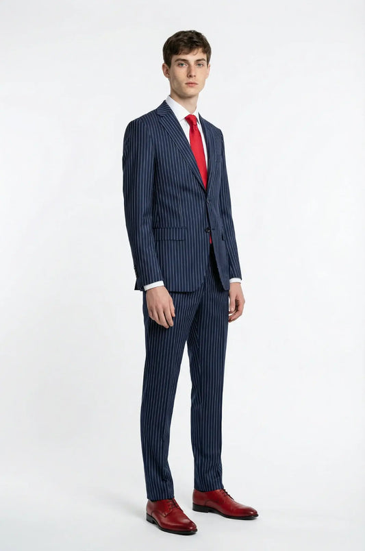 Blutailor Pin Striped Blue 2-Piece Suit – a refined blue ensemble crafted in an Italian worsted wool blend, featuring subtle pinstripes, a custom tailored blazer, and matching trousers for a sharp, sophisticated silhouette.