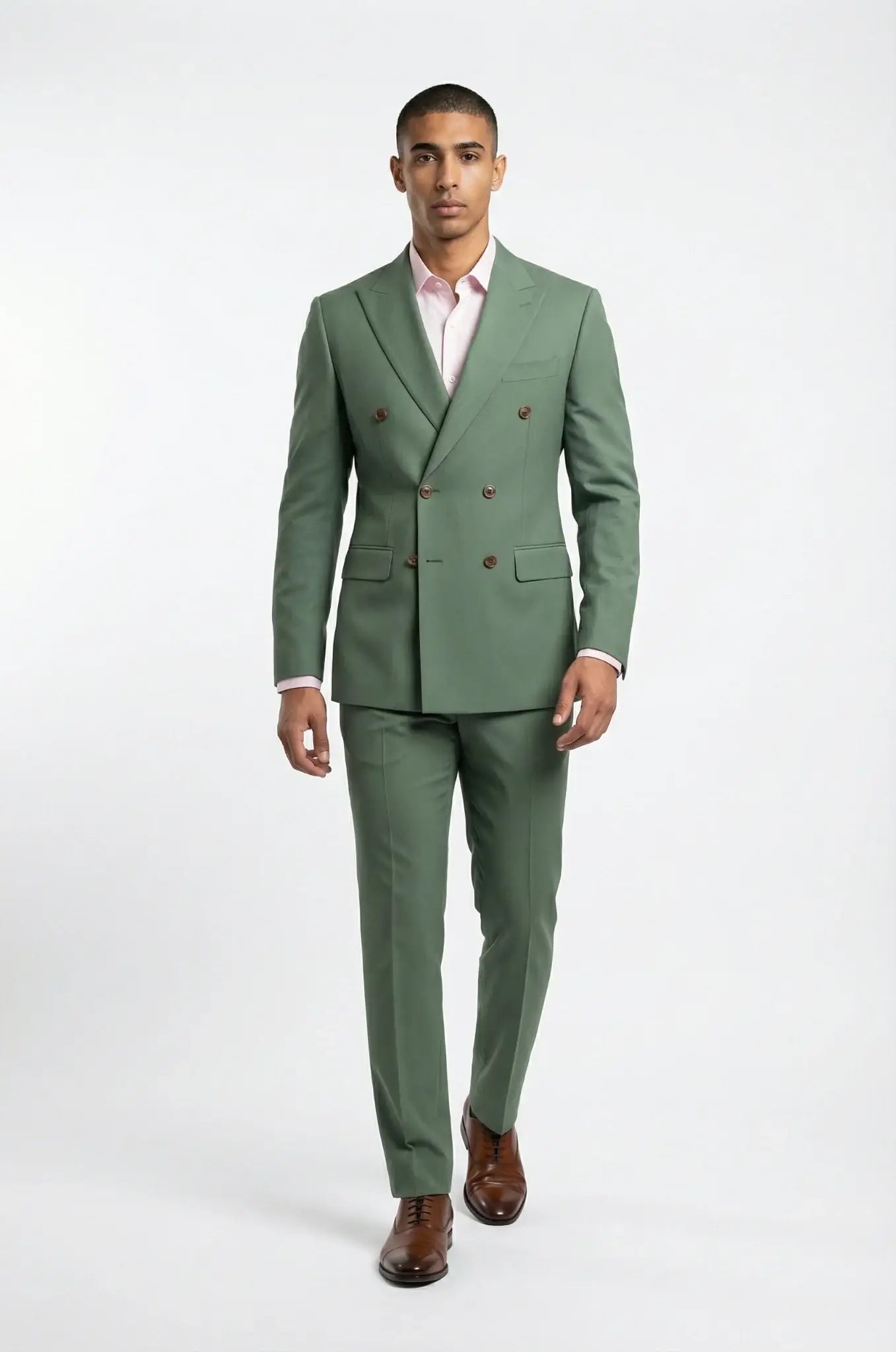 The Blutailor Double Breasted Sage Green Suit – a sophisticated sage green ensemble featuring a bespoke tailored double-breasted blazer and matching trousers, crafted for a sharp, contemporary silhouette and refined formal elegance.