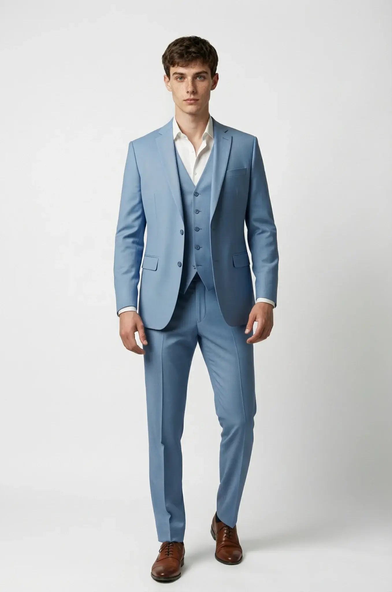 Blutailor Ice Blue 3-Piece Suit – a refined ice blue ensemble featuring a custom tailored blazer, waistcoat, and matching trousers, crafted for a sharp, modern silhouette and timeless formal elegance.