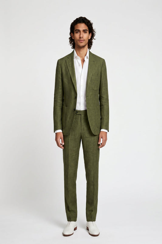 Man wearing a green suit with a white shirt on a white background