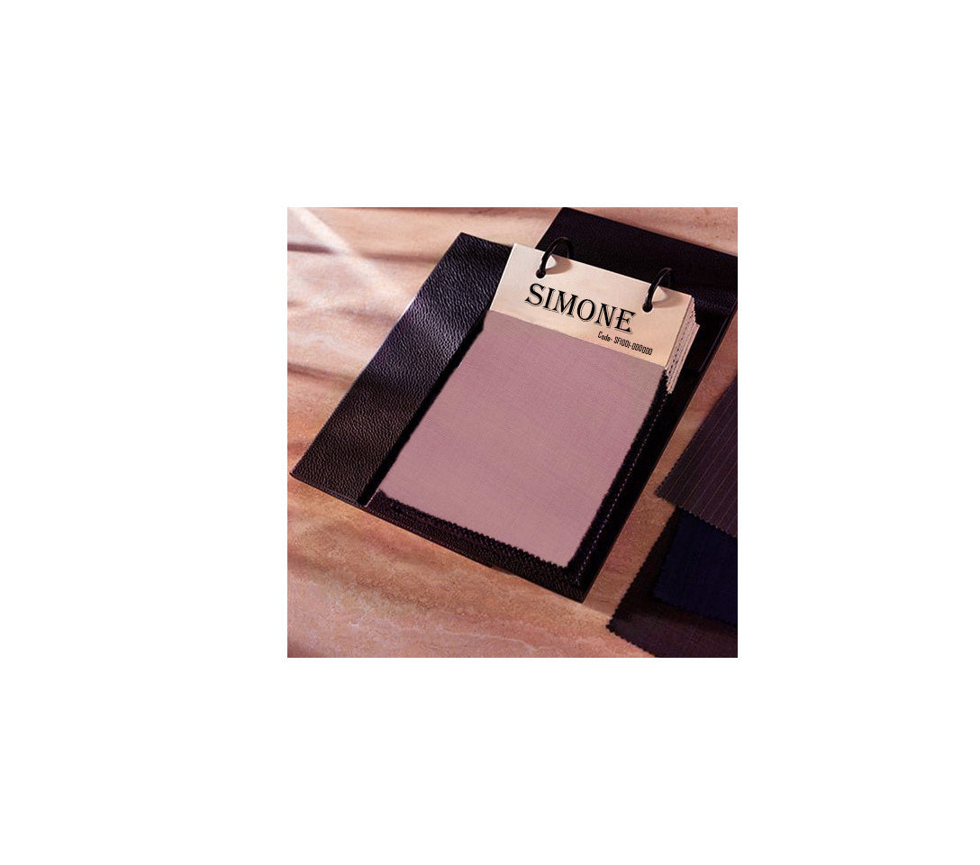 Pink makeup compact with black case and 'Simone' label on a white background