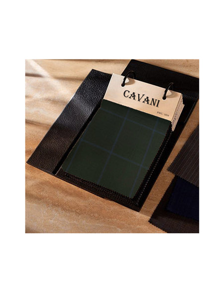 Black leather wallet with a 'Cavani' tag on a wooden surface